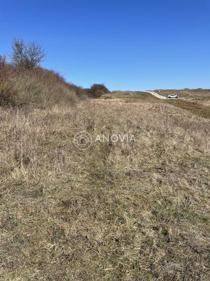 Pozemok určený na výstavbu - Podhorany